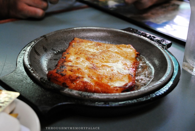 Saganaki - 'kasseri cheese fried in olive oil, flamed'